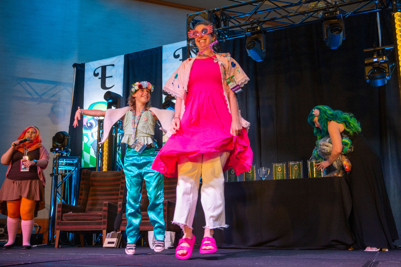 Cosplay contest participants on stage.
