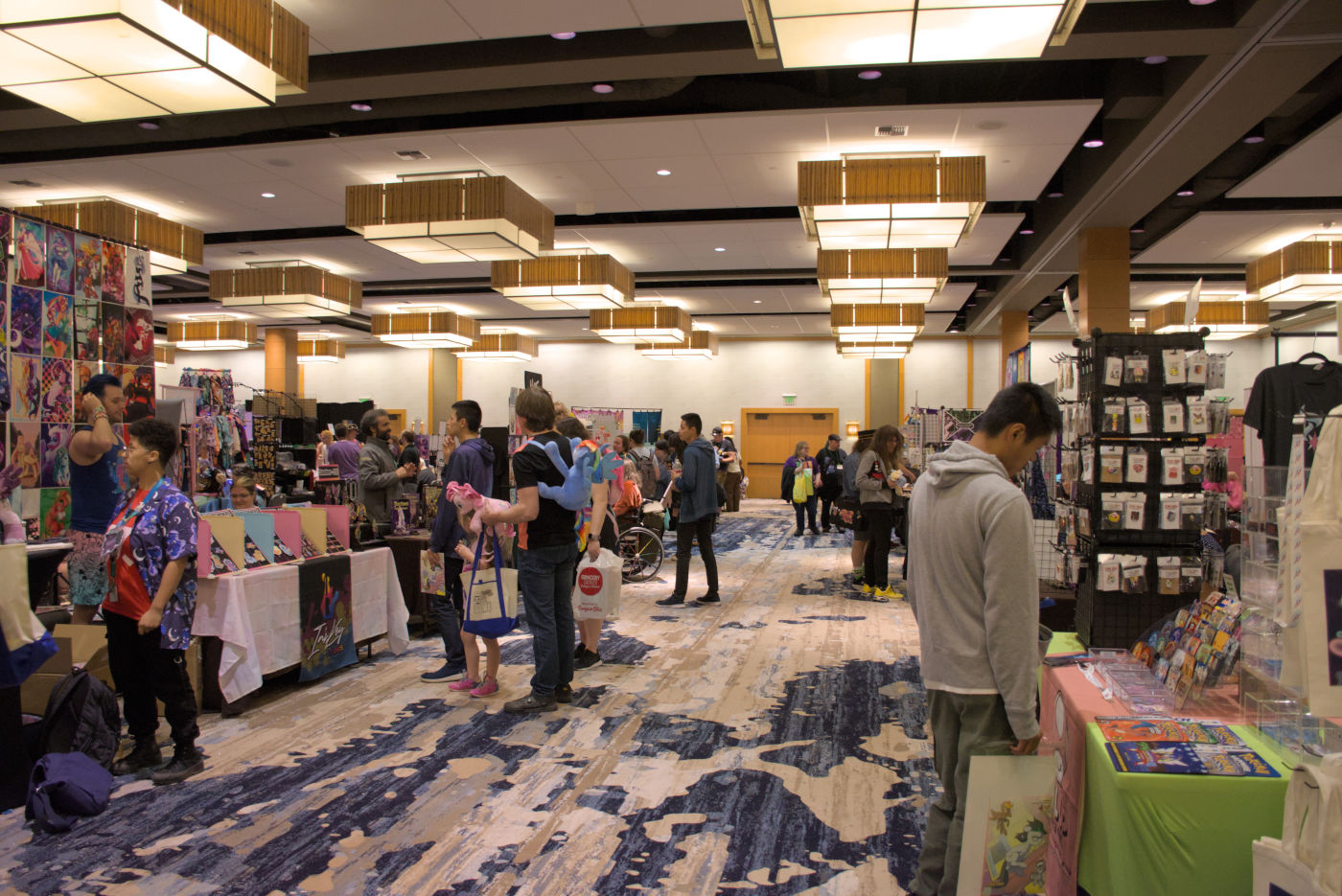 Attendees browsing the vendor hall.